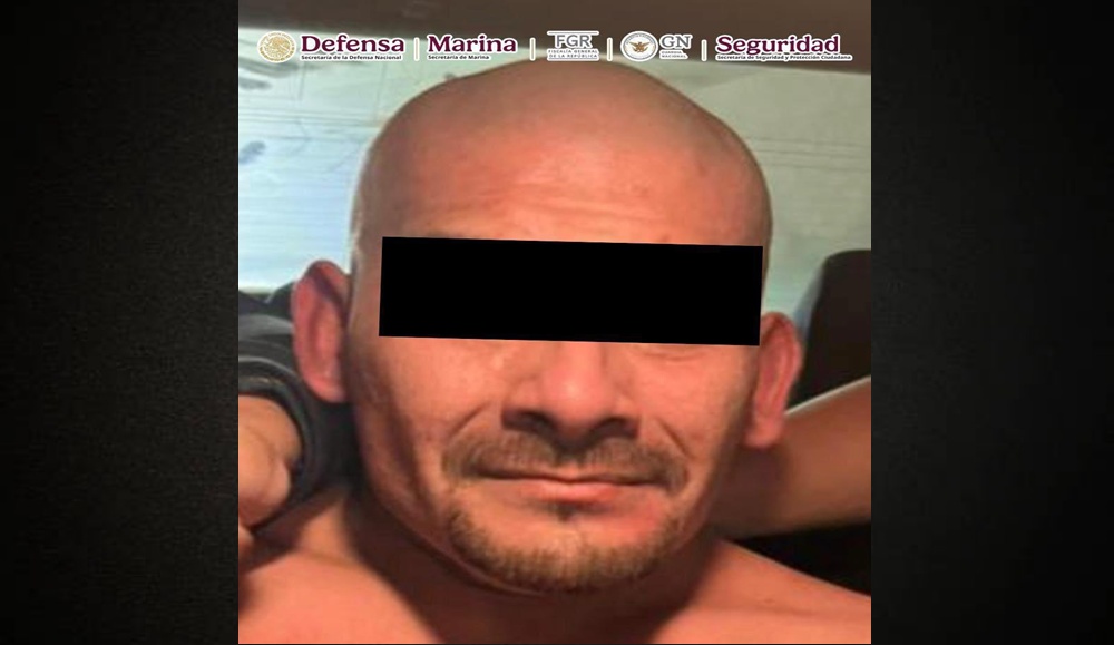 Close-up of a black paper texture background with spotlight.